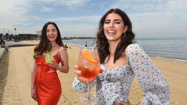 Chiara Mibus and Caitlin Robertson from Republica Bar planning a pop up event at St Kilda beach after Covid restrictions lifted. Picture: Josie Hayden.