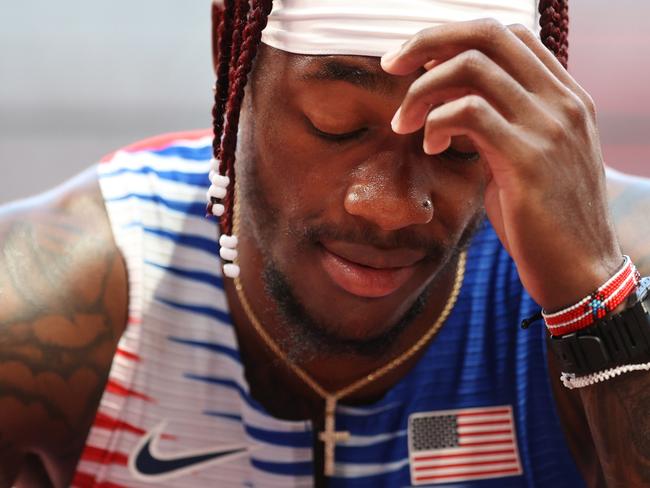 TOKYO, JAPAN - AUGUST 05: Cravon Gillespie of Team United States reacts after coming in sixth in round one of the Men's 4 x 100m Relay Heat 2 on day thirteen of the Tokyo 2020 Olympic Games at Olympic Stadium on August 05, 2021 in Tokyo, Japan. (Photo by Patrick Smith/Getty Images)