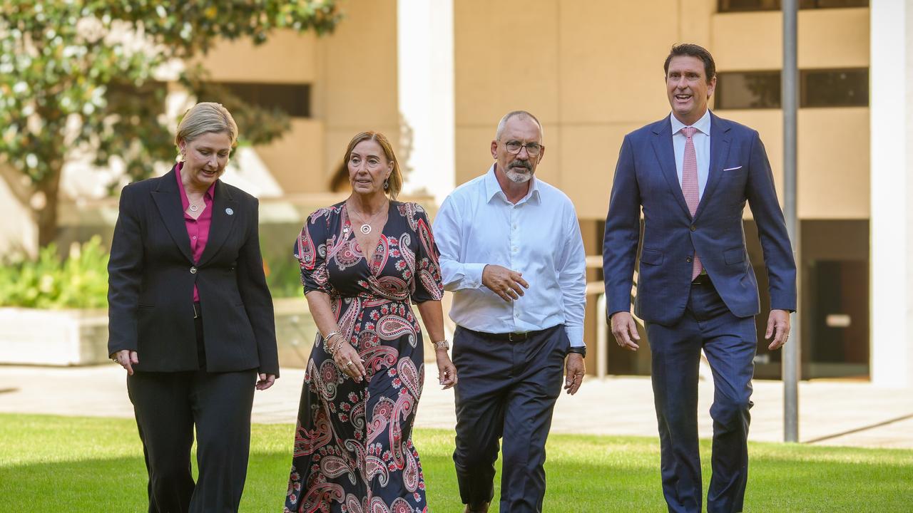 Minister for Police and Emergency Services Dan Purdie with Lloyd and Sue Clarke at Parliament House in Brisbane. Photo: Supplied by the Office of the Premier.