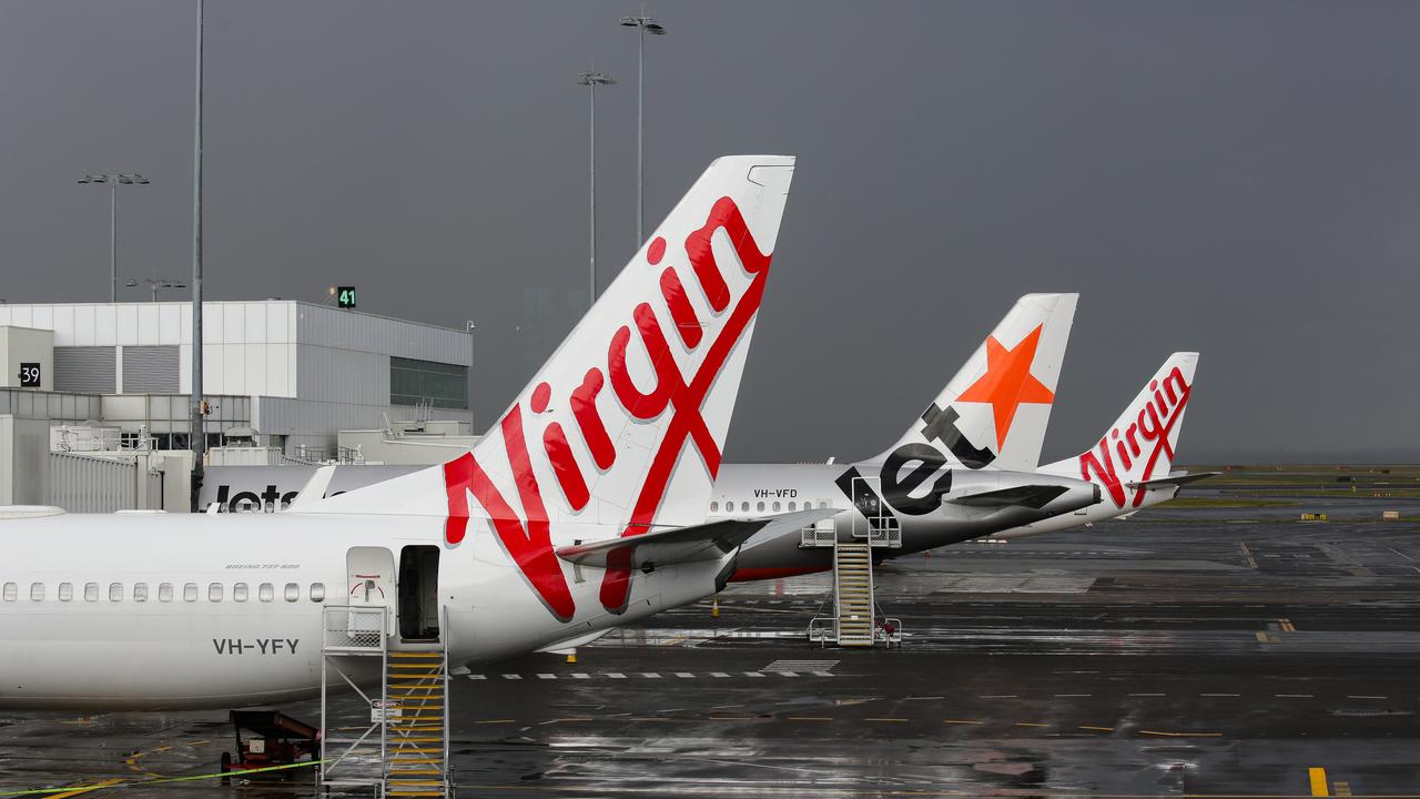 Planes are grounded at Sydney Domestic Airport. Picture: NCA NewsWire / Gaye Gerard