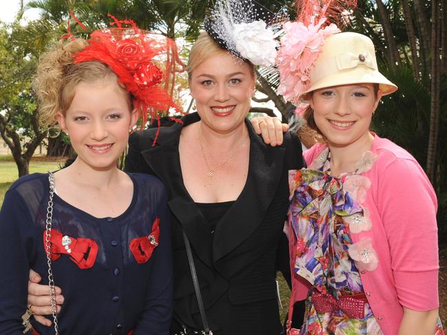 Bronte Shepherd with Angelique and Grace Pickering at the 2011Townsville Ladies Day Races held at the Cluden Race Track