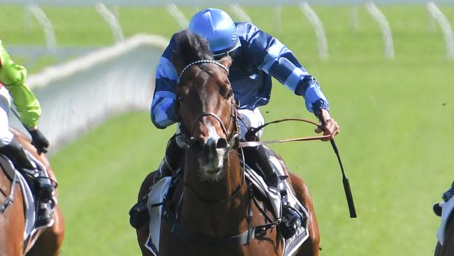 Jockey Jean Van Overmeire (light blue/inside) rides Julian Rock to victory in race 5, the Sydney Roosters  Handicap during Kensington Midweek Racing at Royal Randwick Racecourse in Sydney, Wednesday, October 9, 2019. (AAP Image/Simon Bullard) NO ARCHIVING, EDITORIAL USE ONLY
