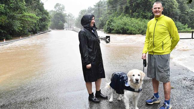 CYCLONE AFLRED: Mooloolah Valley. Pictured, Sue and Glen Turner with their dog Billy. Photo: Patrick Woods.