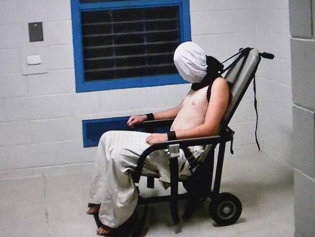 Footage from a 2016 ABC Four Corners report showed teenage boy Dylan Voller hooded and strapped into a chair at a youth detention centre in Darwin. Picture: ABC’s Four Corners/AFP