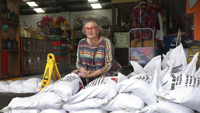 Reverse Garbage CEO Kirsten Junor with sandbags put in place to guard against flooding at their Carrington Road premises. Picture: John Appleyard