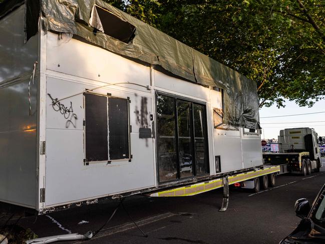 Tiny House being removed by Viper force and sifting below it for evidence, Bikies - Hells Angels clubhouse in Alphington.