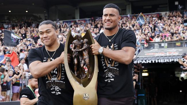 Brian To'o and Stephen Crichton show off the premiership trophy.