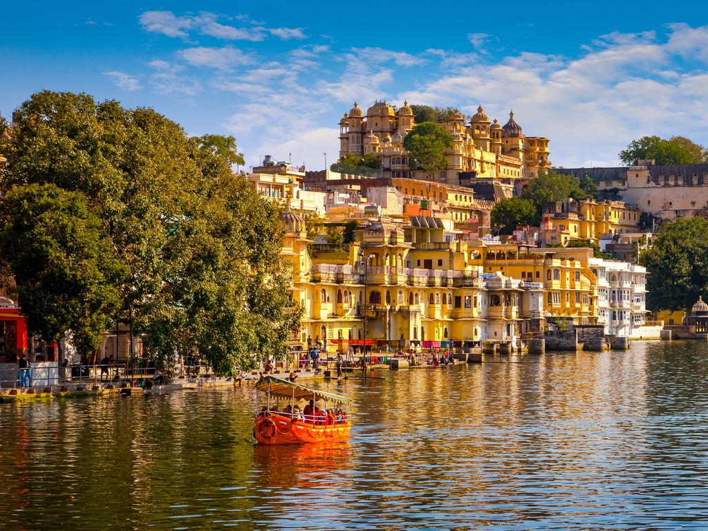 <p><b>UDAIPUR</b> With its creamy-white palaces and shimmering lake, Udaipur is easily one of India&rsquo;s most beautiful cities. Experience it the right way; in December without the crowds and sweltering heat. Sail down <a href="https://www.escape.com.au/travel-advice/doc-holiday-put-udaipur-on-the-itinerary-for-a-twoweek-tour-of-india/news-story/f46c2a7b8c04b78f5f8f4ded3c3f33f6" target="_blank" rel="noopener">Lake Eichola</a>, an oasis surrounded by lofty Palaces, temples, bathing ghats and lush green hills.<b><br>PRO TIP: </b>For accommodation, don&rsquo;t go past a haveli &ndash; an old merchants house with closed-off courtyards and plenty of charm &ndash; like <a href="https://www.booking.com/hotel/in/karohi-haveli.en-gb.html" target="_blank" rel="noopener">Karohi Haveli</a>.</p>