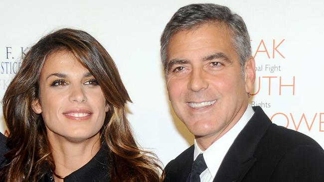 Elisabetta Canalis and George Clooney attend the 2010 Robert F. Kennedy Center for Justice & Human Rights Ripple of Hope Awards Dinner at Pier Sixty at Chelsea Piers on November 17, 2010 in New York City.