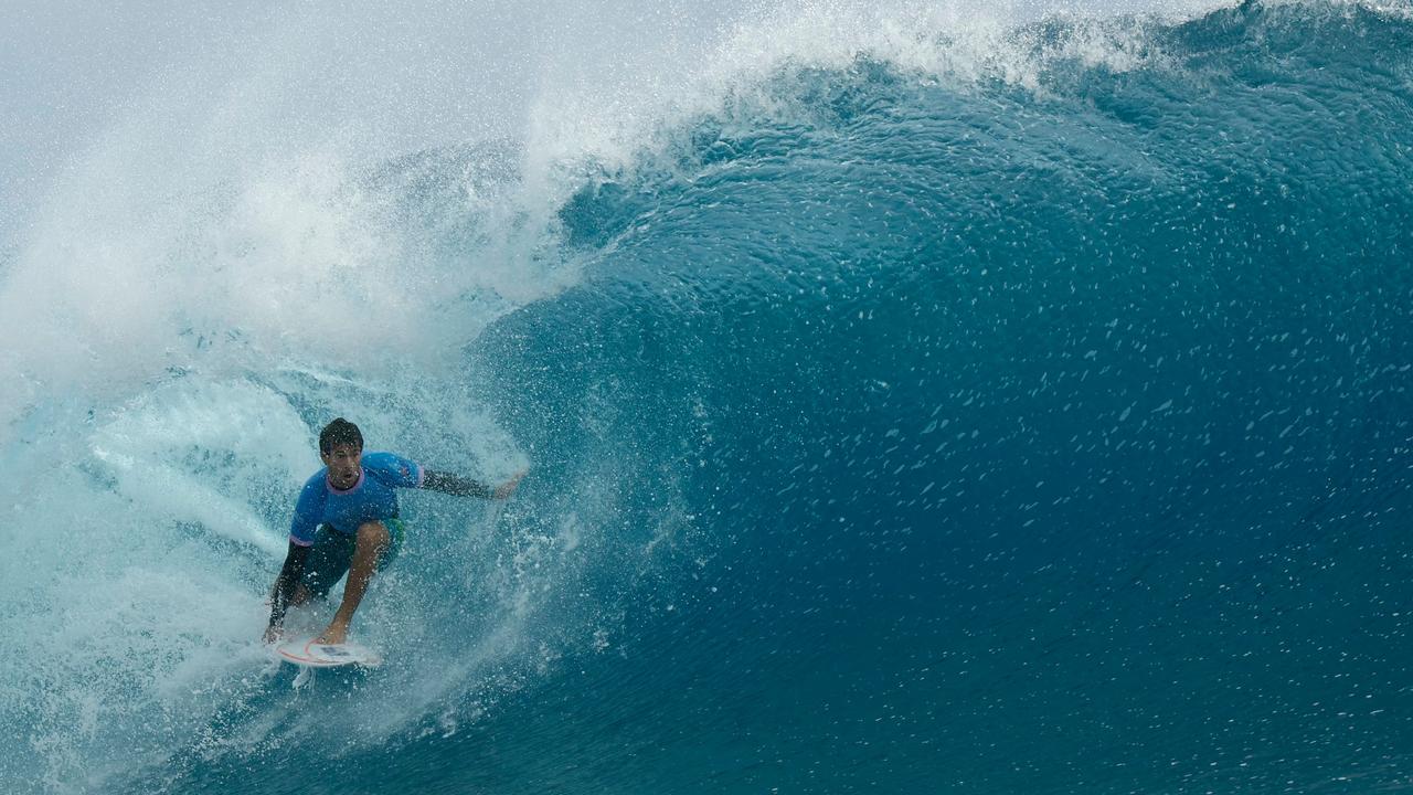 Australia's Jack Robinson, seen here riding his silver medal wave, said: “I imagined myself doing it for that little kid who was inspired or motivated to be here one day.” Picture: Ben Thouard/POOL/AFP