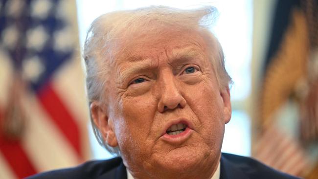 US President Donald Trump speaks to the press after signing an executive order to create a US sovereign wealth fund, in the Oval Office of the White House on February 3, 2025, in Washington, DC. (Photo by Jim WATSON / AFP)