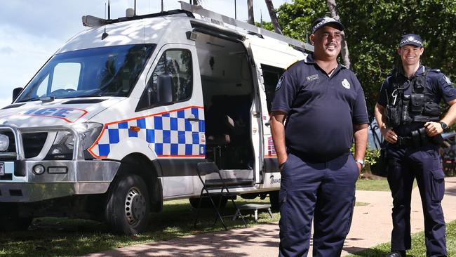 Cairns Police launched a mobile initiative earlier this year with vans in suburbs including the northern beaches, where police Liaison Officer Lloyd Bickler and Constable Clay Cox are pictured – but business owners in the CBD say they need police on the beat in the city streets Picture: Brendan Radke