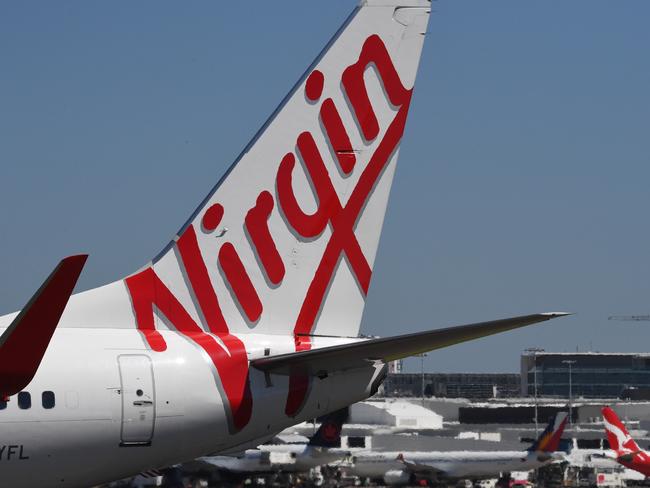 A Virgin Australia plane is seen at Sydney Airport, Wednesday February 28, 2018. Virgin Australia's board has decided against delisting the airline from the ASX following discussions with major shareholders. (AAP Image/Peter Rae) NO ARCHIVING