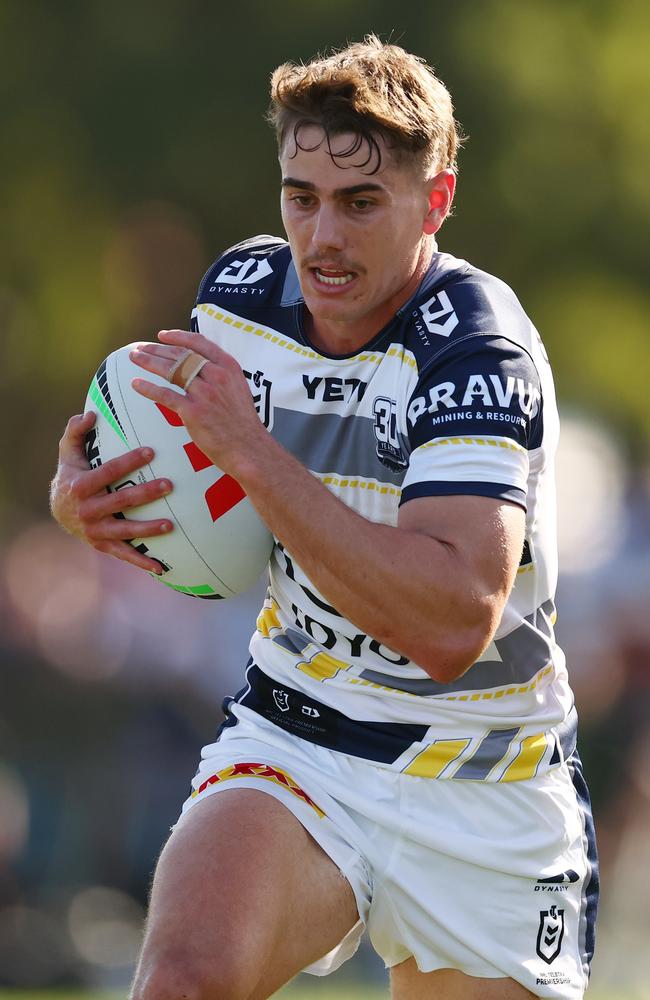 Tom Duffy of the Cowboys runs with the ball during the 2025 NRL Pre-Season Challenge match between Melbourne Storm and North Queensland Cowboys at Casey Fields on February 23, 2025 in Melbourne, Australia. (Photo by Morgan Hancock/Getty Images)