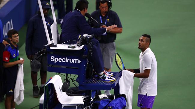 Nick Kyrgios talks to the chair umpire during his Men's Singles first round match against Steve Johnson on day two of the 2019 US Open.