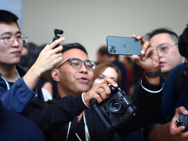 Apple’s iPhone 11 launch a year ago in pre-pandemic times. This year’s September launch is a streamed event only. Picture: AFP