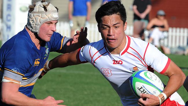 Ipswich Grammar player Kalani Thomas takes on the pack. GPS Rugby match, Churchie v Ipswich Grammar at Anglican Church Grammar school on Oaklands Parade, East brisbane. Saturday August 18, 2018. (AAP image, John Gass)