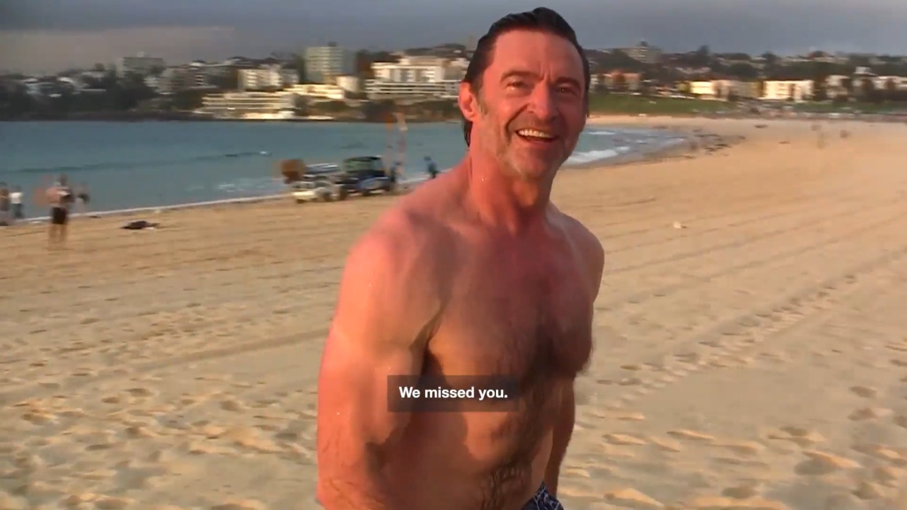 Hugh Jackman says he's in 'Heaven' as he's filmed going for a morning dip in Bondi