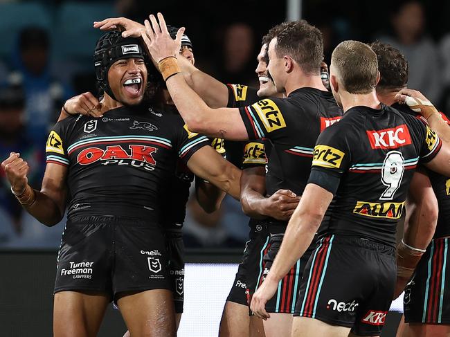 SYDNEY, AUSTRALIA - SEPTEMBER 22:  Stephen Crichton of the Panthers celebrates with Dylan Edwards of the Panthers after scoring a try during the NRL Preliminary Final match between the Penrith Panthers and Melbourne Storm at Accor Stadium on September 22, 2023 in Sydney, Australia. (Photo by Brendon Thorne/Getty Images)