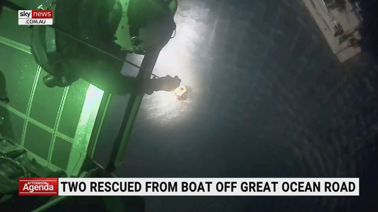 Police airwing winches two people to safety off the Great Ocean Road