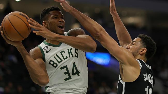 Ben Simmons blocks Giannis Antetokounmpo during the first half of a pre-season game in Milwaukee, Wisconsin. Picture: Getty Images/AFP