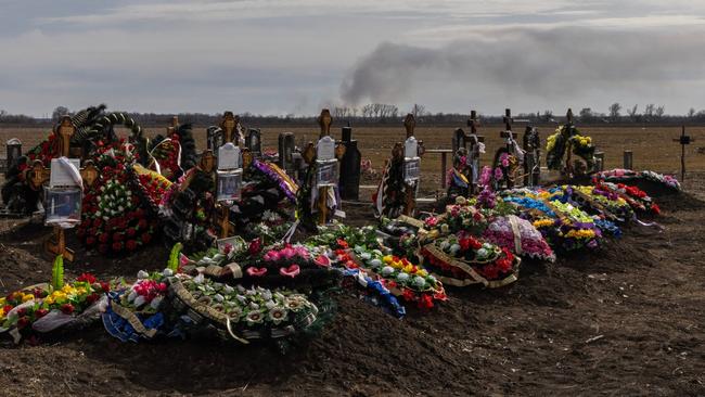 The graves of some of those killed in October last year when a Russian missile struck a café hosting the wake of a fallen Ukrainian soldier. Picture: Jack Hill/The Times