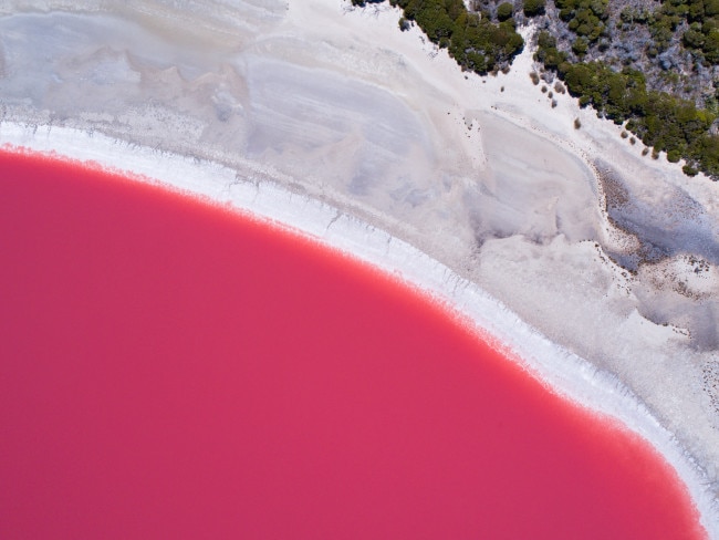 <span>32/50</span><h2>Lake Hillier, WA</h2><p>Move aside millennial pink. This WA lake is all about the shock factor with those deep fuchsia hues, clashing fantastically with the blues of the Indian Ocean. Located 130 km from Esperance on Middle Island, this surreal, salty lake is best seen from the sky. Picture: Tourism Western Australia</p>