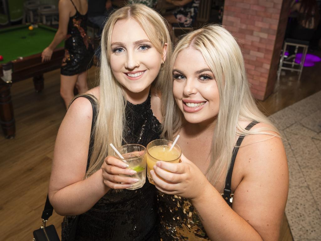 Tyla Mitchell (left) and Macy Lebsanft on New Year's Eve at Tatts, Sunday, December 31, 2023. Picture: Kevin Farmer