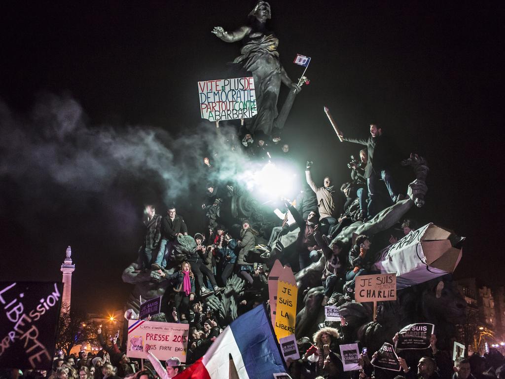 “March Against Terrorism in Paris” by photographer Corentin Fohlen, Divergence for Stern and Paris Match, which won second prize in the Spot News singles category shows a demonstration against terrorism in Paris, after a series of five attacks occurred across the Ile-de-France region, beginning at the headquarters for satirical newspaper Charlie Hebdo, Paris, France, Jan. 11, 2015.(Corentin Fohlen/Divergence for Stern and Paris Match, World Press Photo via AP)