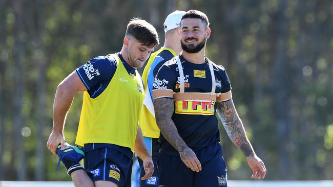 Gold Coast have named hookers Mitch Rein (left) and Nathan Peats in their 21-man squad for Sunday’s Round 13 clash with Brisbane. Picture: AAP/Dave Hunt