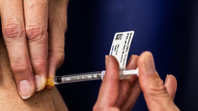 A nurse administers the AstraZeneca COVID-19 vaccine to a patient at the Austin Hospital in Melbourne on Wednesday. Picture: Getty Images