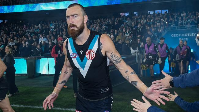 ADELAIDE, AUSTRALIA - AUGUST 03:  Charlie Dixon of the Power   follows his team out during the round 21 AFL match between Port Adelaide Power and Sydney Swans at Adelaide Oval, on August 03, 2024, in Adelaide, Australia. (Photo by Mark Brake/Getty Images)