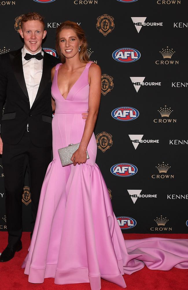 Clayton Oliver of the Demons and partner Sophie Harmer. Picture: AAP Image/Julian Smith.