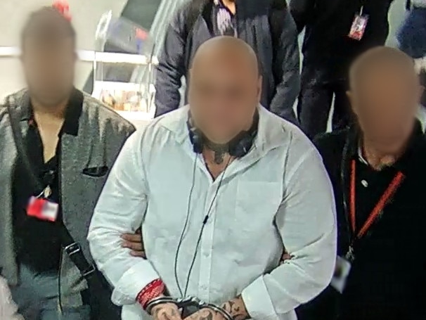 New Zealand Mongrel Mob thug Timoti Kapene Te Amo has been deported. Australian Border Force officials put teh convicted criminal on a plane from Melbourne to Auckland on October 24, 2018.