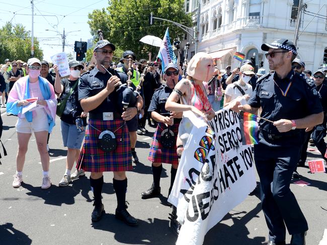 A small group of protesters clash with police who were marching in the Midsumma Pride Parade along Fitzroy Street St Kilda. Picture: Andrew Henshaw