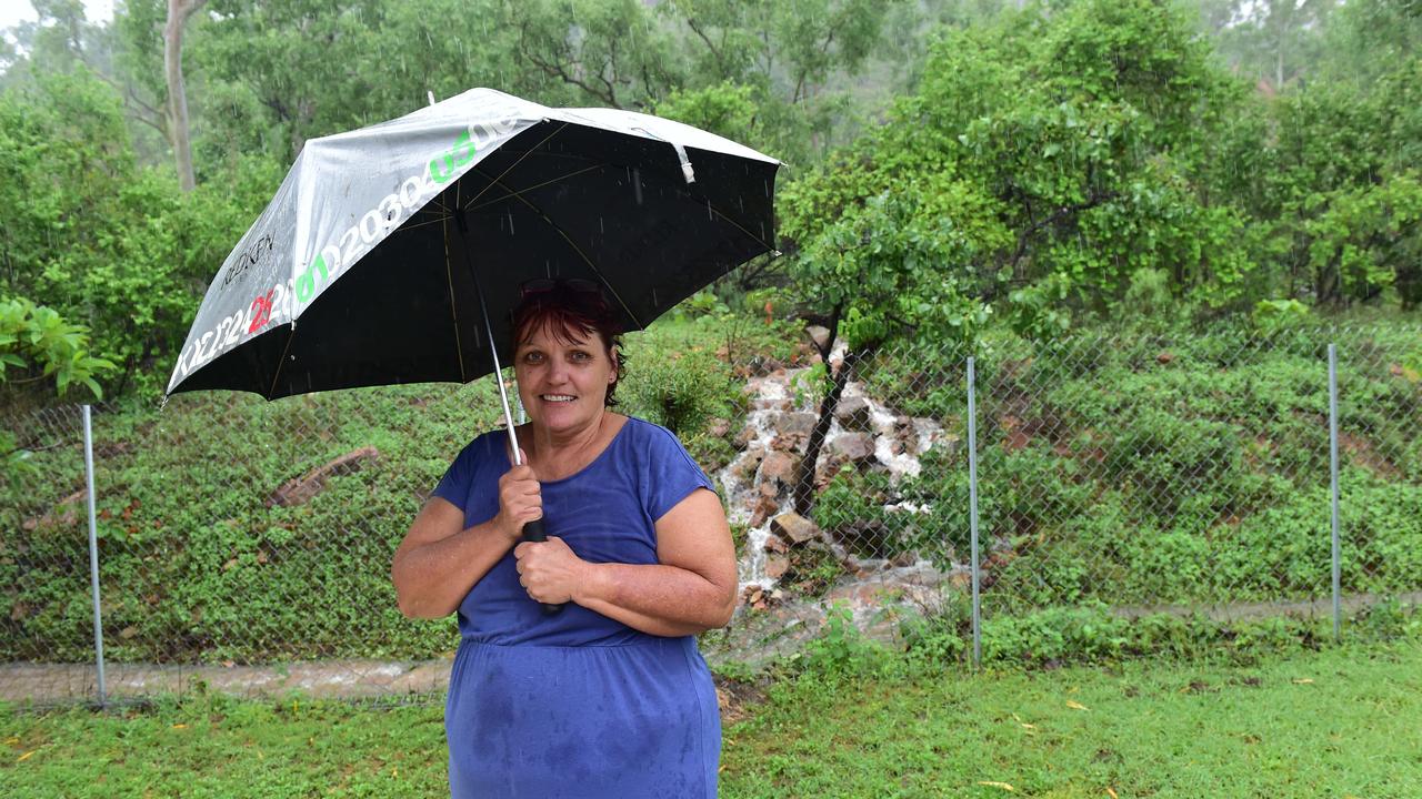 Jean Austin, pictured at the back of her Wulguru property, has been told to evacuate. Picture: Shae Beplate