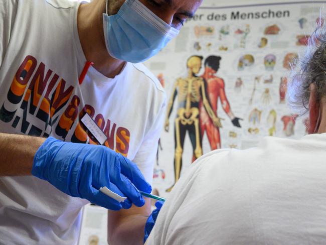 A man gets a BioNtech-Pfizer Covid-19 coronavirus vaccine in a mobile vaccination centre in Hemmingen near Ludwigsburg, southern Germany. Picture: AFP