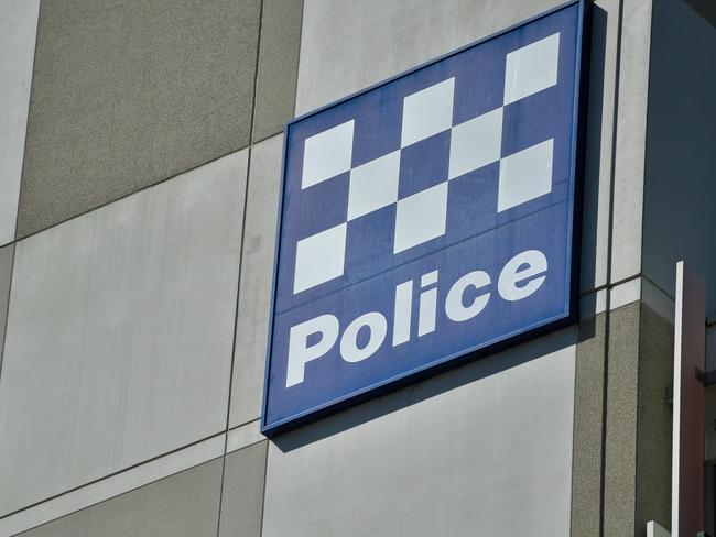 'Police' signage is seen at the Police Headquarters on Angas Street in Adelaide, Monday, April 2, 2018. (AAP Image/Morgan Sette) NO ARCHIVING