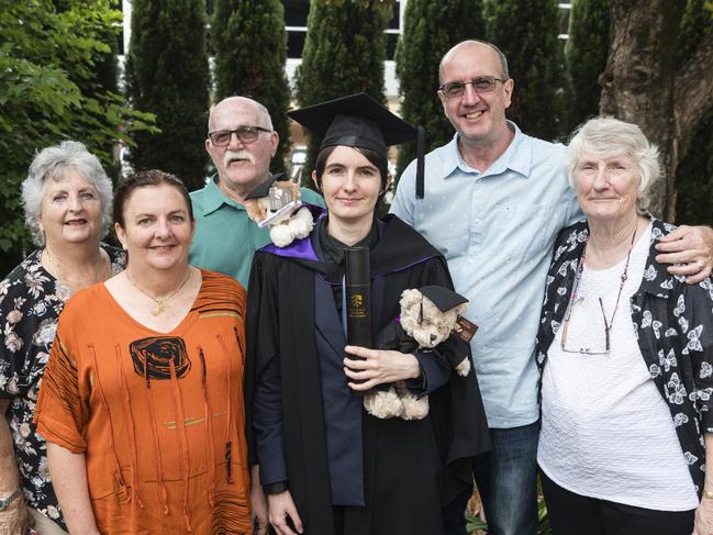 Bachelor of Laws graduate Dakota Smith with (from left) Cheryl Smith, Meg Smith, Graham Smith, Cameron Bremner and Diane Bremner at a UniSQ graduation ceremony at Empire Theatres, Tuesday, February 13, 2024. Picture: Kevin Farmer