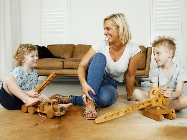 Dr Kristy Goodwin at home with her children, Billy, 3, and Taj, 6, in North Manly. Picture: Justin Lloyd