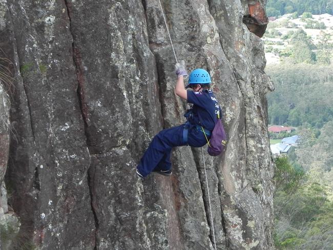 Biggenden cadet Samson Wykamp checks his footing as he abseils down Mt Ngungun.