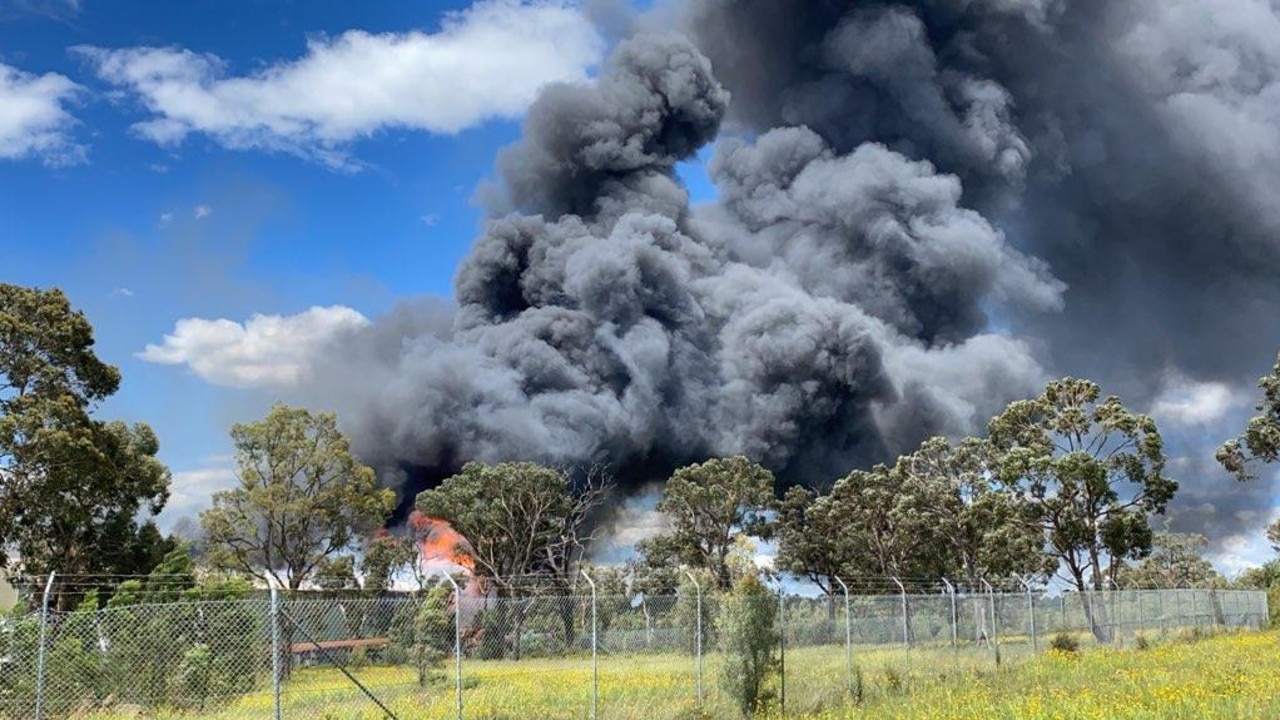 Smoke is seen billowing from the industrial complex in Kurri Kurri.