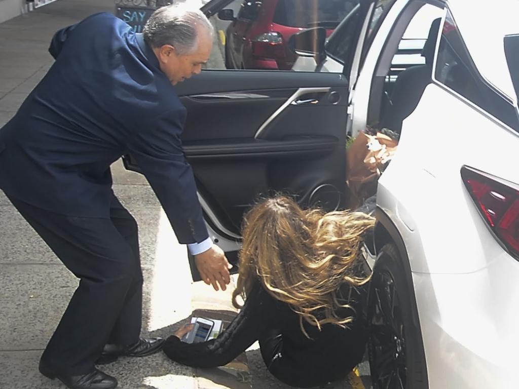 Elle Macpherson took a nasty tumble as she left a local florist in Sydney. Picture: MEDIA-MODE.COM