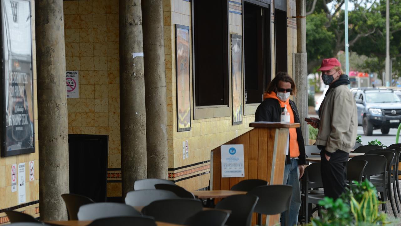 Patrons wearing masks sign in to the Northern Hotel in Byron Bay. Picture: Liana Boss