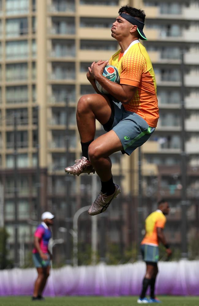 Jordan Petaia takes a high ball during Wallabies training in Tokyo on Wednesday. Picture: Getty Images