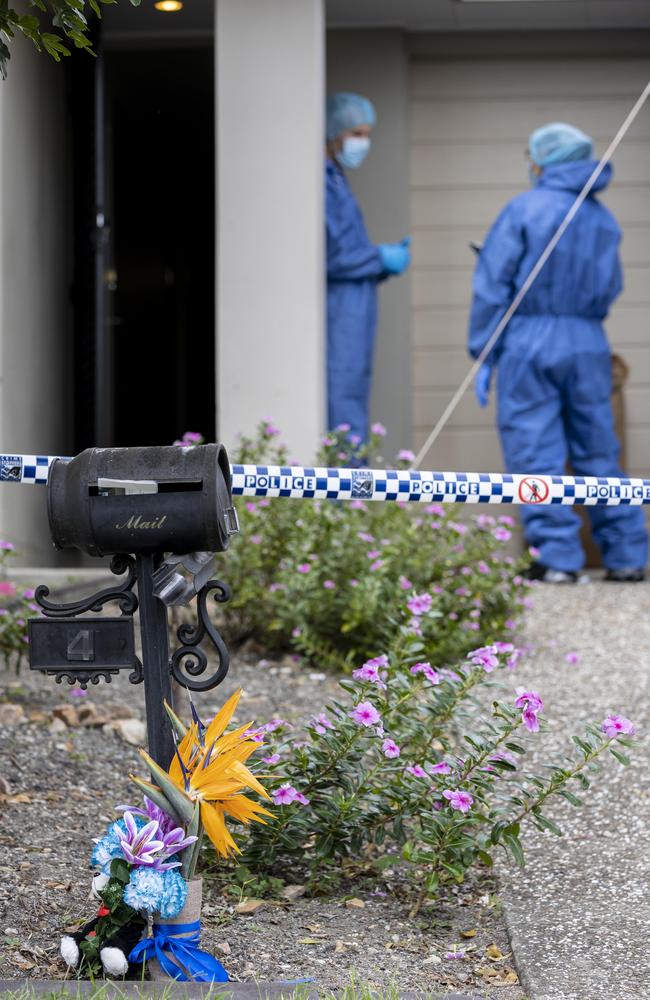 Flowers and a teddy left beside a letterbox at the Bundamba home where Krystle Monks is understood to have collapsed at the weekend before dying in hospital. Police and forensics have been at the property since Sunday, February 5.