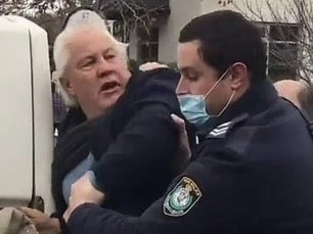 Footage of the owners of a Bowral food store being arrested. Picture: Instagram