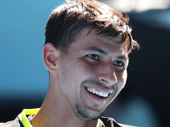 MELBOURNE, AUSTRALIA - JANUARY 07: Alexei Popyrin of Australia reacts in the exhibition match against Jannik Sinner of Italy ahead of the 2025 Australian Open at Melbourne Park on January 07, 2025 in Melbourne, Australia. (Photo by Kelly Defina/Getty Images)