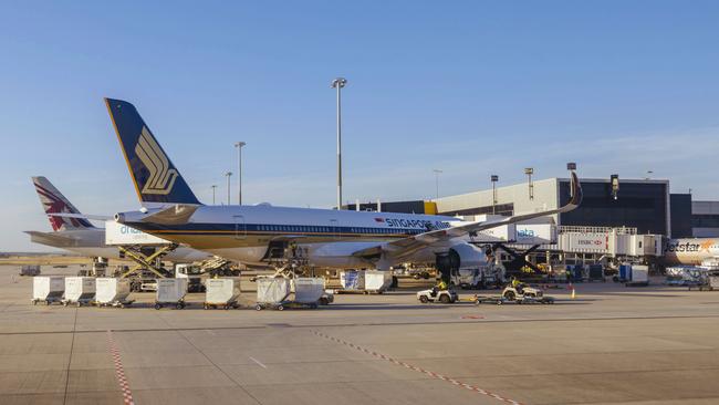A Singapore Airlines plane being prepared for boarding.