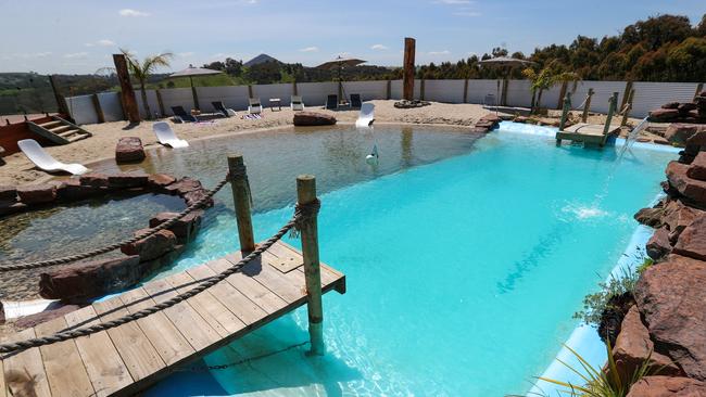 The most lavish pools, like this backyard beach at 250 Smiths Lane, Sunday Creek, might set you back a bit more than $150,000. Picture: Alex Coppel